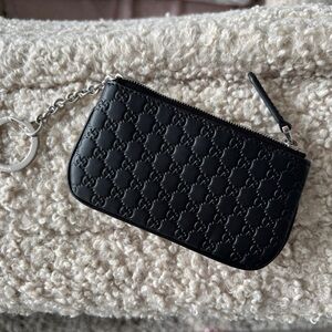Authentic Gucci Black Embossed Leather keychain pouch
